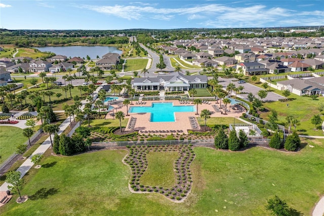 birds eye view of property featuring a water view