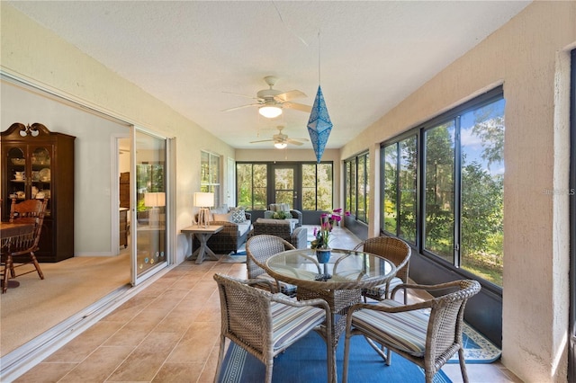 sunroom / solarium with ceiling fan