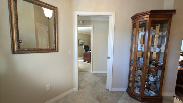 corridor with crown molding