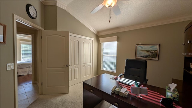 tiled home office with lofted ceiling, crown molding, ceiling fan, and a textured ceiling