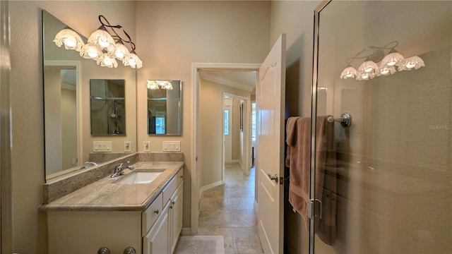 bathroom featuring vanity and ornamental molding