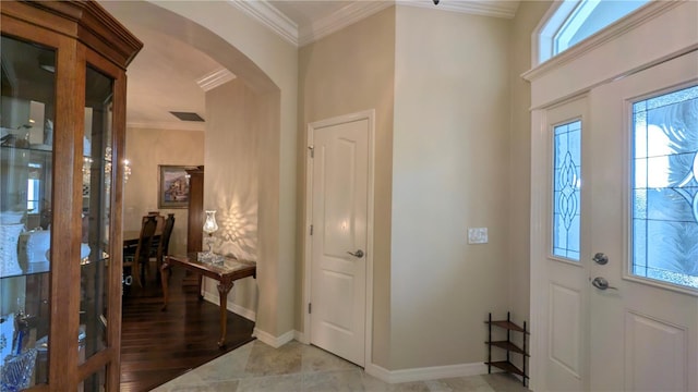 entryway with crown molding