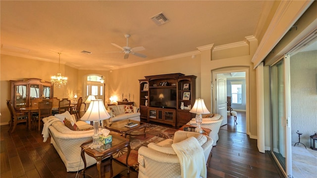 living room featuring crown molding, dark hardwood / wood-style flooring, and ceiling fan with notable chandelier