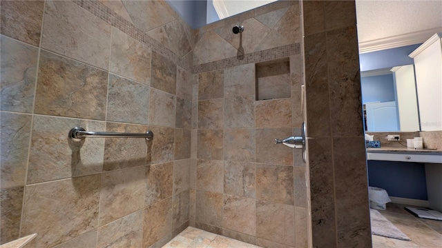 1881 Sassparilla Way, The Villages, FL 32162 - full bath with a tile shower, vanity, and crown molding
