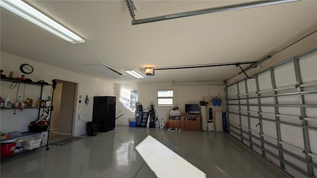 1881 Sassparilla Way, The Villages, FL 32162 - garage with a garage door opener