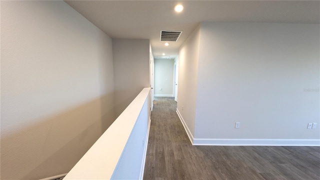 hallway featuring dark wood-type flooring