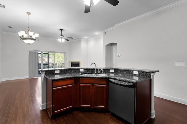 kitchen featuring dishwasher, sink, and a kitchen island with sink