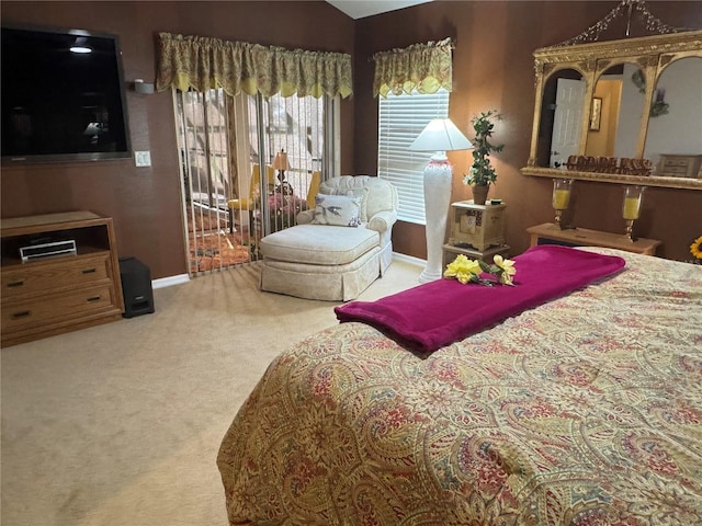 carpeted bedroom with vaulted ceiling