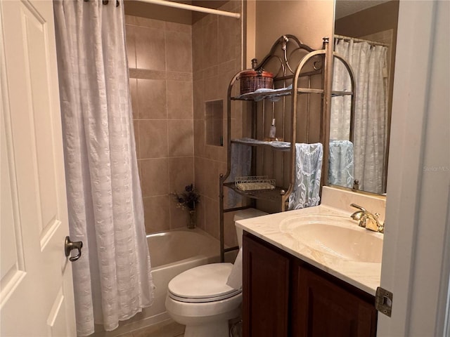 full bathroom with toilet, vanity, and shower / tub combo with curtain