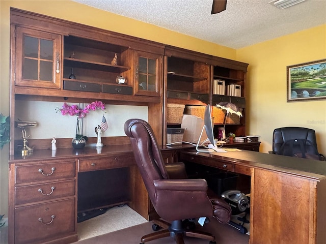 office space featuring a textured ceiling and visible vents