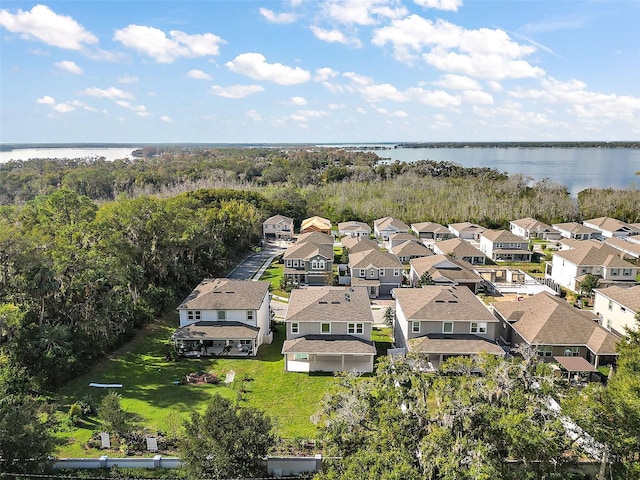 drone / aerial view with a water view