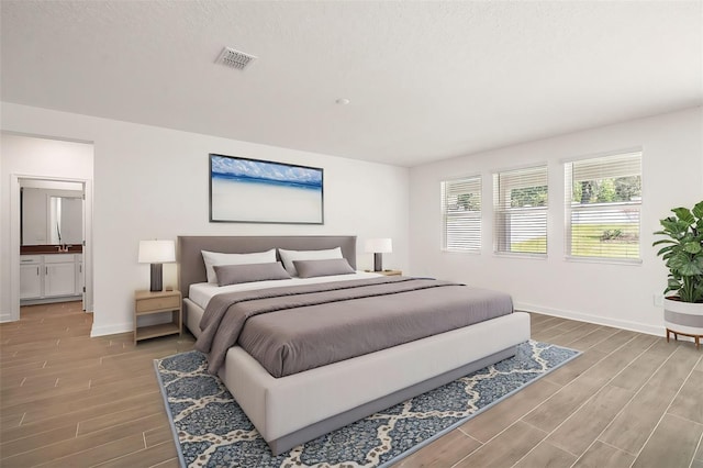 bedroom with a textured ceiling