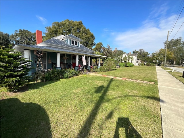 view of front of house featuring a porch and a front yard