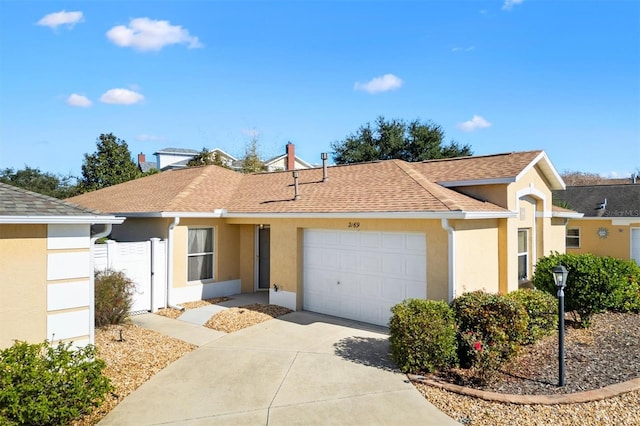 ranch-style home with a garage