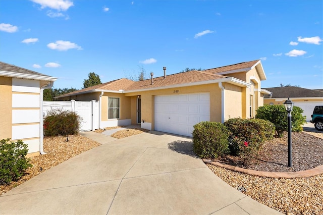 single story home with a garage