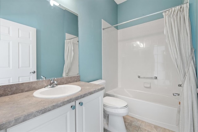 full bathroom with tile patterned floors, vanity, toilet, and shower / bath combo with shower curtain