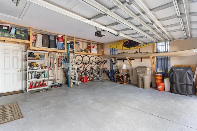 garage featuring a garage door opener