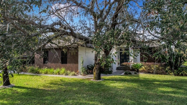 view of front of house with a front yard