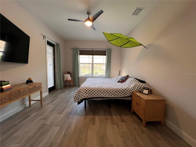 bedroom featuring ceiling fan and light wood-type flooring