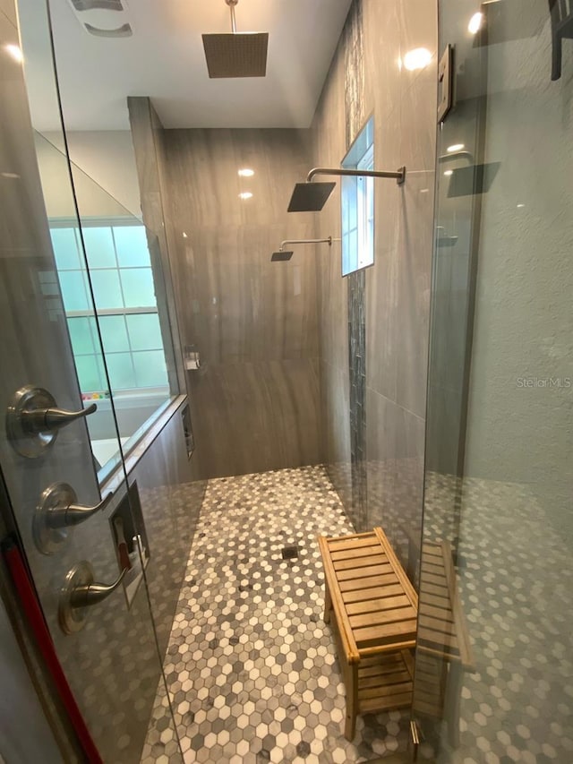 bathroom featuring an enclosed shower