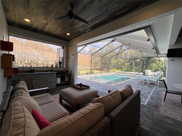 view of patio featuring an outdoor kitchen, an outdoor hangout area, and an outdoor wet bar