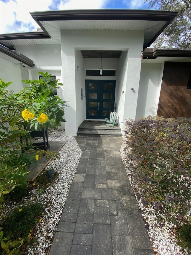 entrance to property featuring french doors