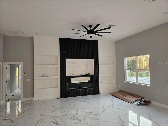 entrance foyer with baseboards, visible vents, marble finish floor, and ceiling fan