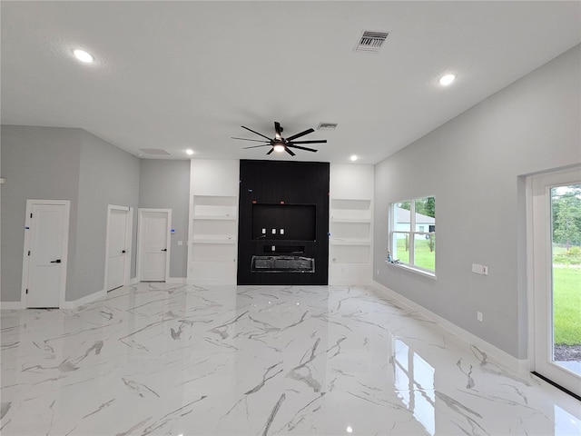 42157 Tamarac St, Eustis, FL 32736 - unfurnished living room featuring recessed lighting, ceiling fan, baseboards, and light marble finish flooring