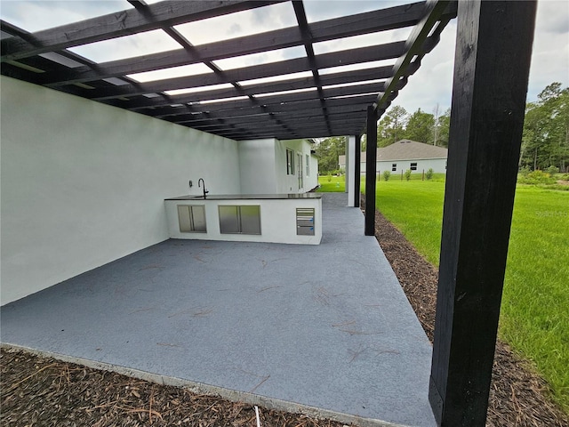 42157 Tamarac St, Eustis, FL 32736 - view of patio / terrace with a pergola and a sink