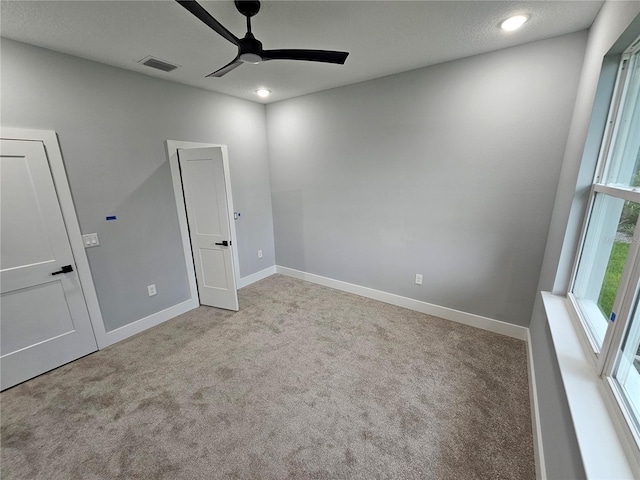 42157 Tamarac St, Eustis, FL 32736 - unfurnished bedroom with carpet flooring, baseboards, a ceiling fan, and recessed lighting