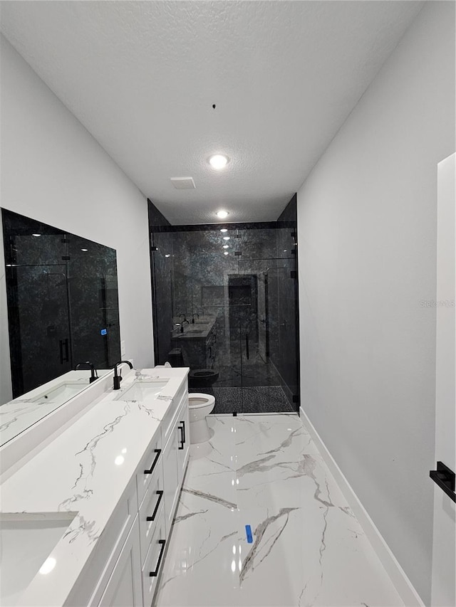 42157 Tamarac St, Eustis, FL 32736 - bathroom with marble tiled flooring, toilet, a marble finish shower, baseboards, and double vanity