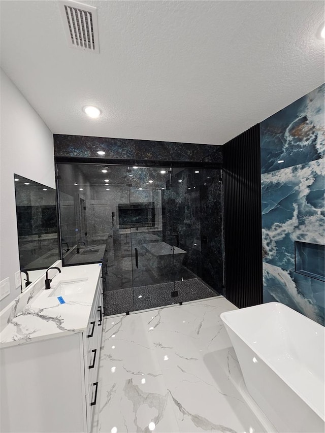 42157 Tamarac St, Eustis, FL 32736 - full bath featuring vanity, a soaking tub, marble tiled flooring, a marble finish shower, and wallpapered walls