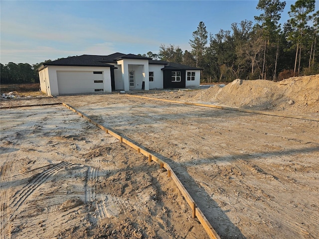 prairie-style home with a garage