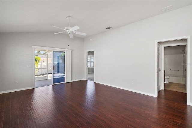 spare room with lofted ceiling, ceiling fan, and dark hardwood / wood-style floors