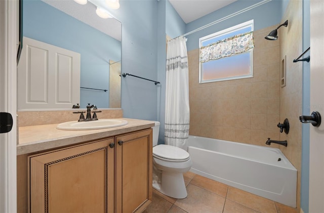 full bathroom featuring toilet, tile patterned floors, vanity, and shower / tub combo with curtain