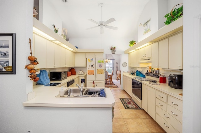 kitchen with kitchen peninsula, ceiling fan, sink, black appliances, and cream cabinets