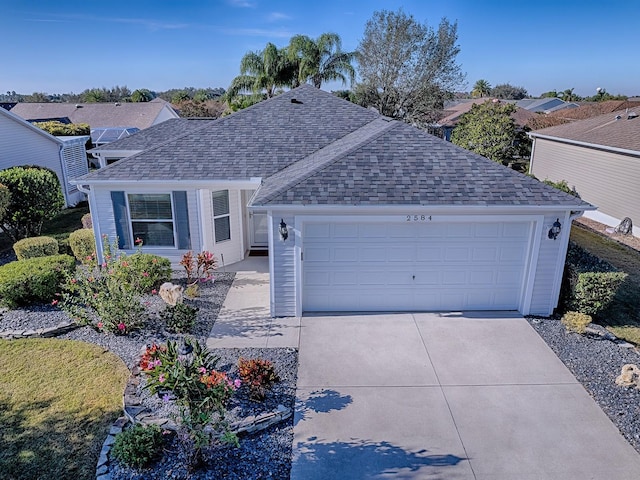 single story home with a garage