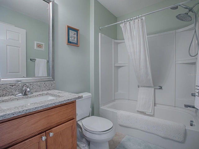 full bathroom with tile patterned floors, toilet, vanity, and shower / bathtub combination with curtain