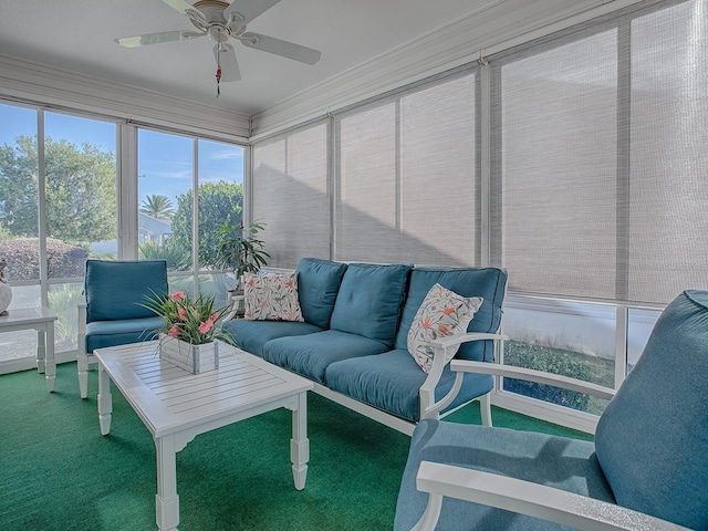 sunroom / solarium featuring ceiling fan and plenty of natural light