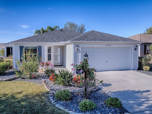 ranch-style home featuring a garage