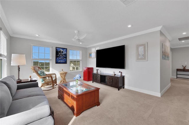 carpeted living room with ceiling fan and crown molding