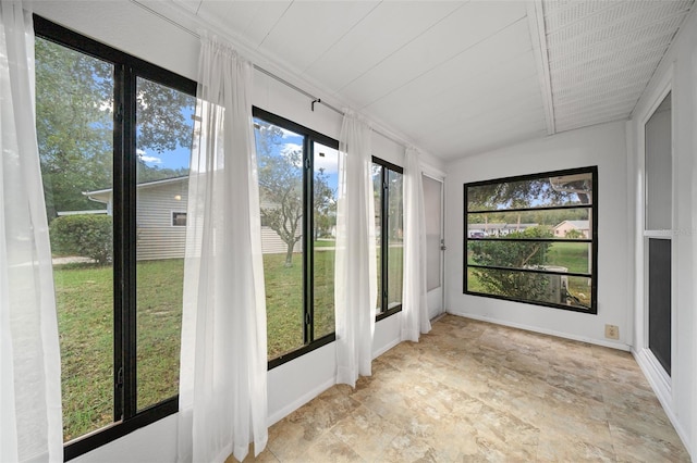 unfurnished sunroom featuring plenty of natural light