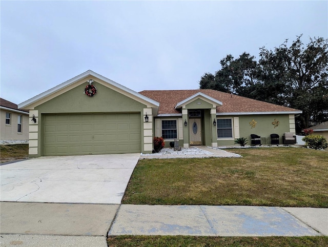 ranch-style home with a garage and a front yard