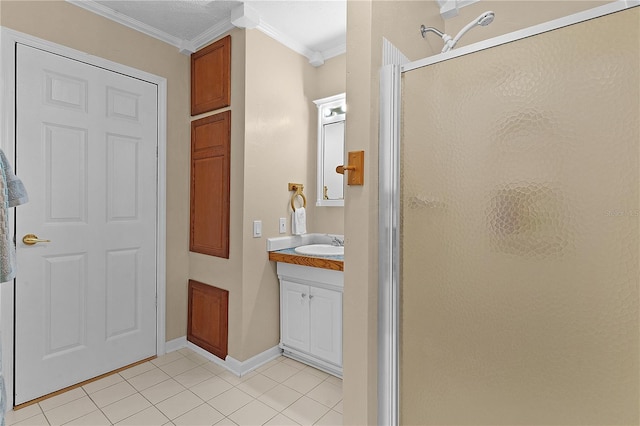 bathroom featuring crown molding, tile patterned flooring, vanity, and walk in shower