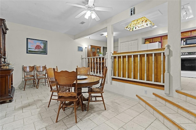 dining room with ceiling fan