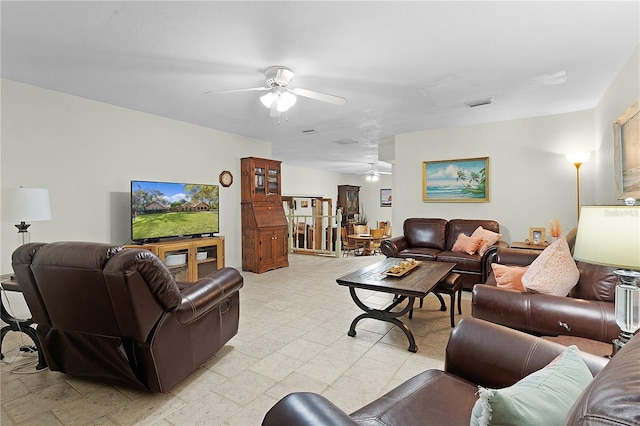 living room featuring ceiling fan