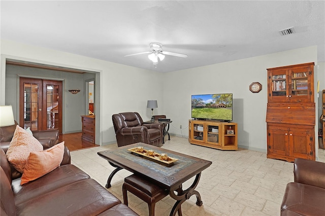 living room with ceiling fan