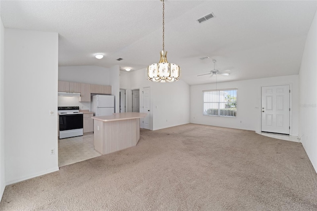 kitchen with light colored carpet, electric range oven, a center island, ceiling fan with notable chandelier, and white refrigerator