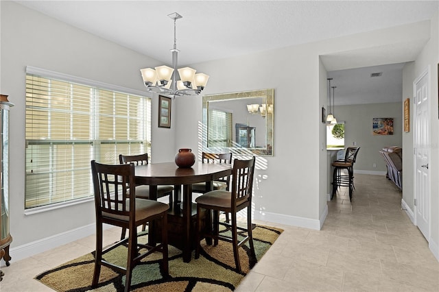1741 Bonser Rd, Minneola, FL 34715 - dining area featuring a chandelier and light tile patterned floors