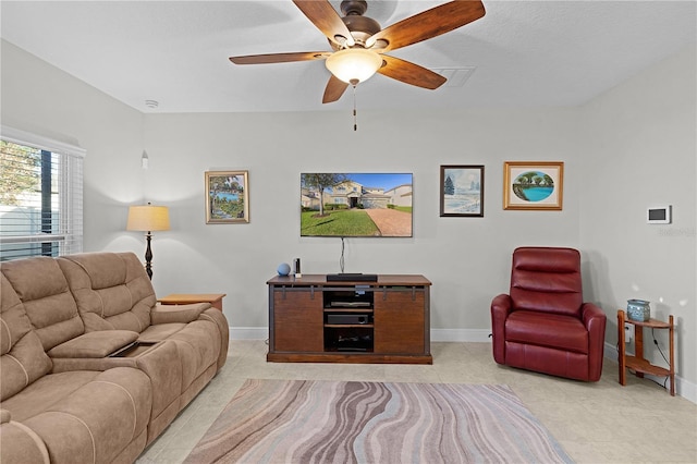 1741 Bonser Rd, Minneola, FL 34715 - living area with a ceiling fan and light tile patterned floors